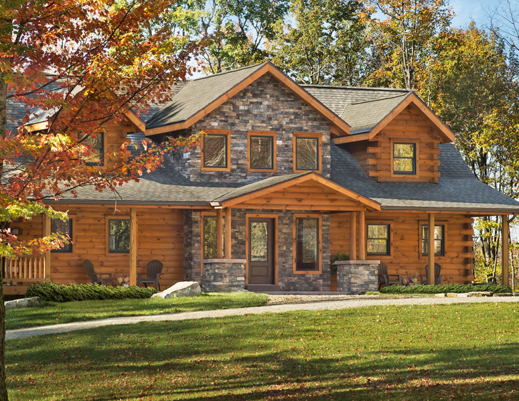 Large log cabin treated with Outlast® CTA Products