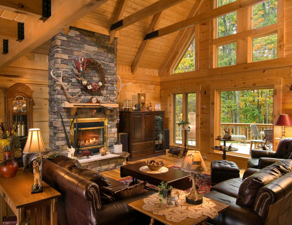 The inside of an A-Frame log cabin living room treated with Outlast® CTA Products